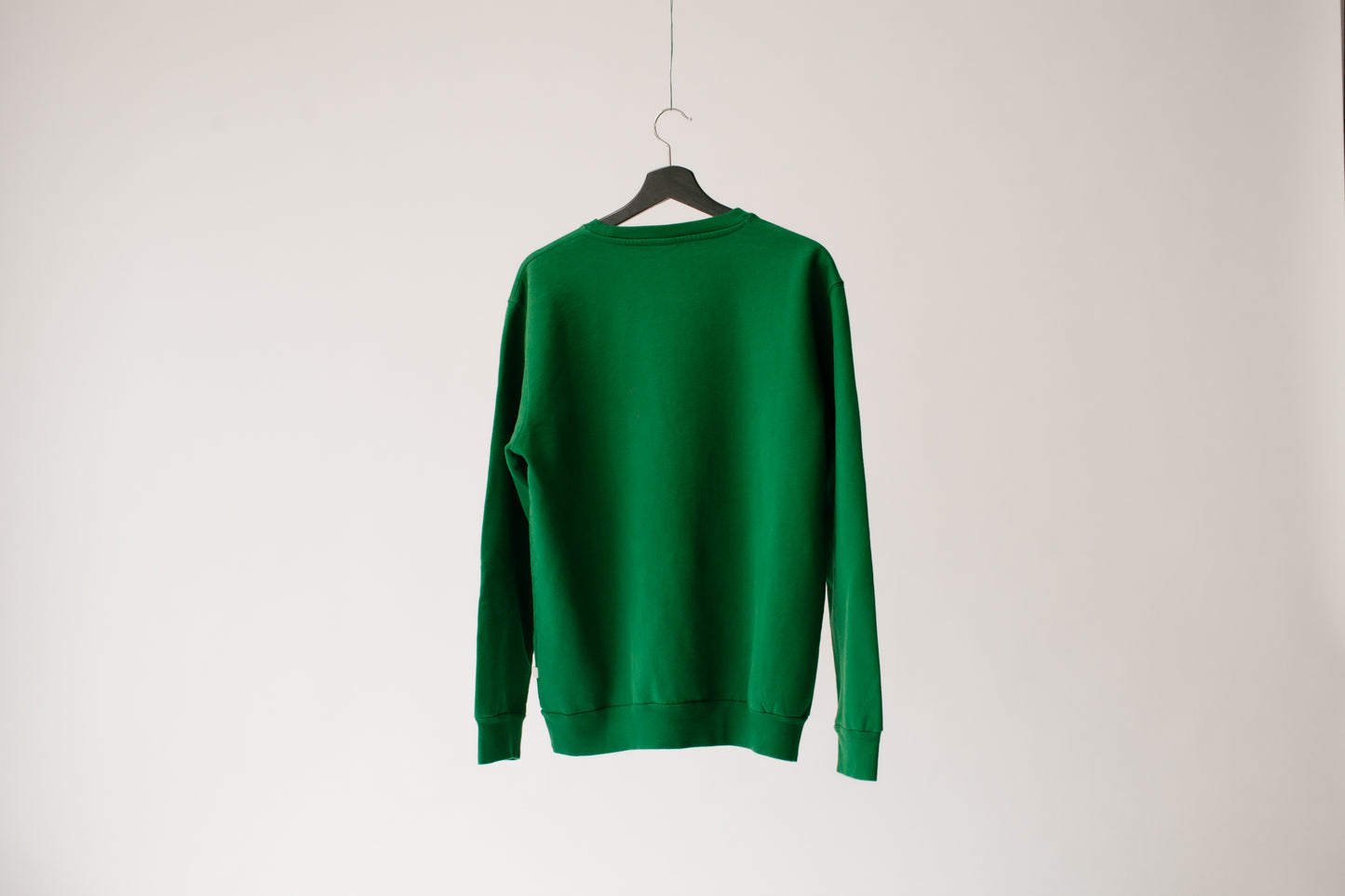 Green crewneck logo