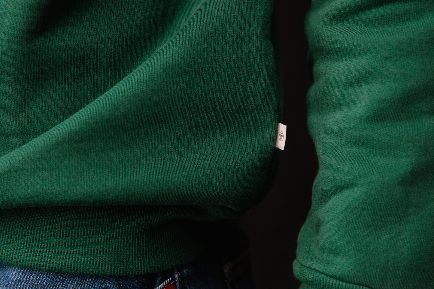 Green crewneck logo